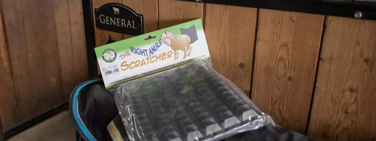 Right Angle Scratcher packaged